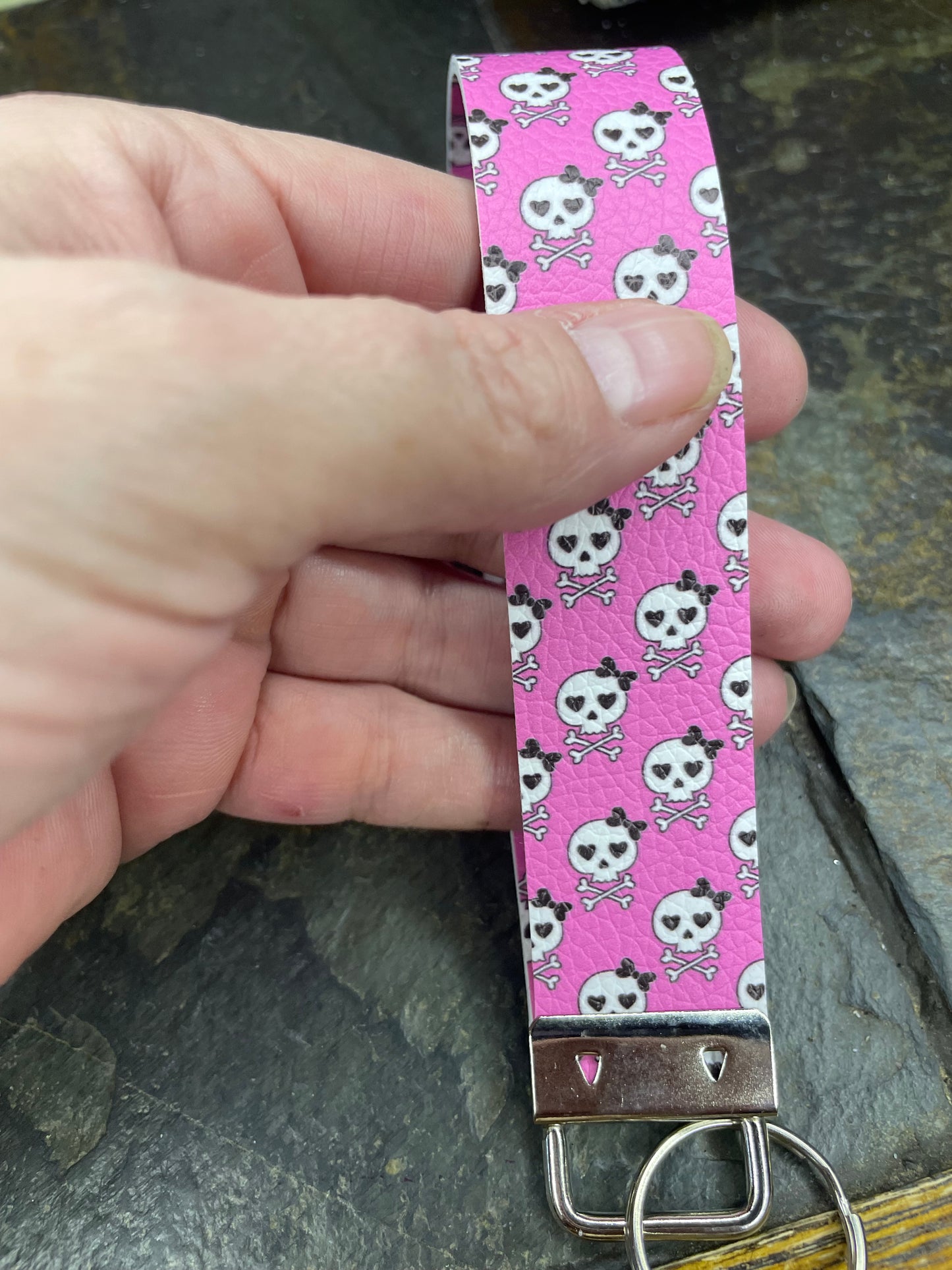 Skulls on pink! Halloween wristlet for your little goth girl.