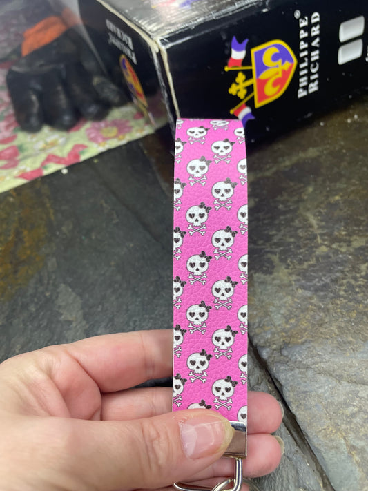 Skulls on pink! Halloween wristlet for your little goth girl.